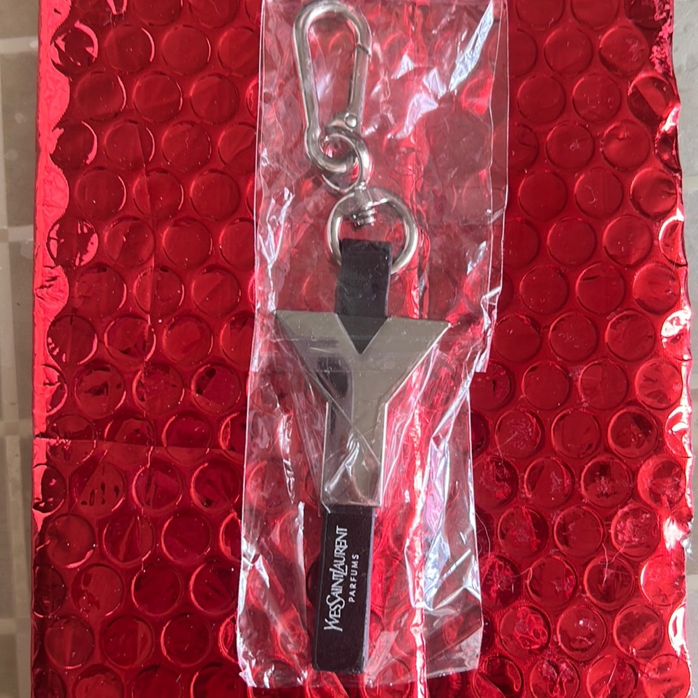 XX SOLDXX Brand new YSL Yves Saint Laurent bag charm or keychain.